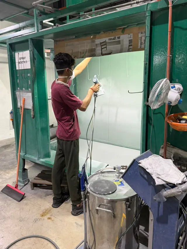 Manual Powder Spraying at the Standard Coating facility, Perai